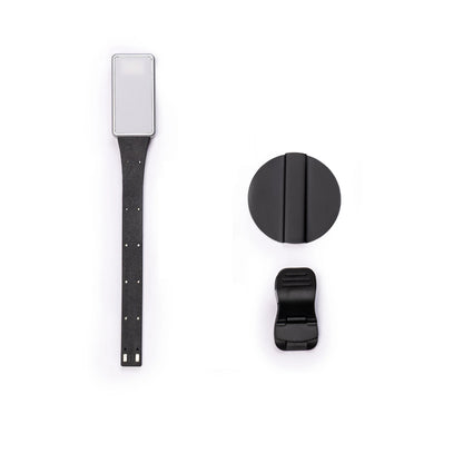 Magnetic eReader light strap with rectangular LED module and clip, plus round magnet