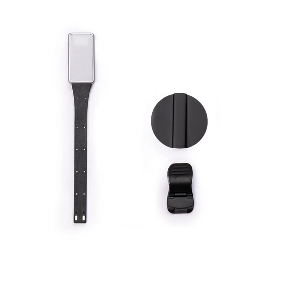 Magnetic eReader light strap with rectangular LED module and clip, plus round magnet
